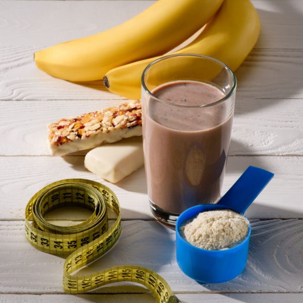 glass-of-protein-shake-with-bananas-and-energy-bar-2021-08-31-22-13-36-utc (1)